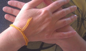 The three knots in this gold thread remind me to stay true to myself.